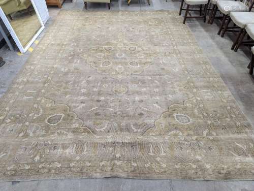 A contemporary North West Persian style pale wool carpet, 42...