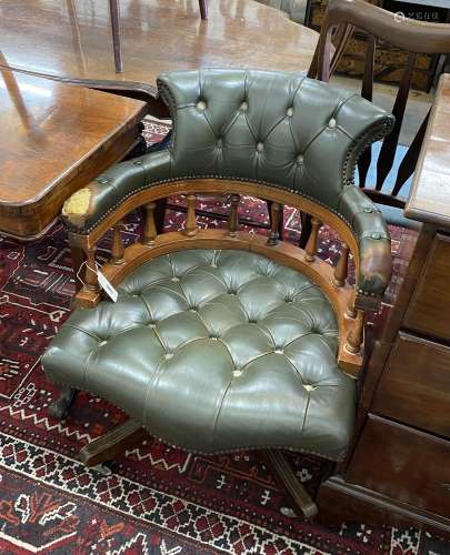 A Victorian style green leather, stained beech swivel desk c...