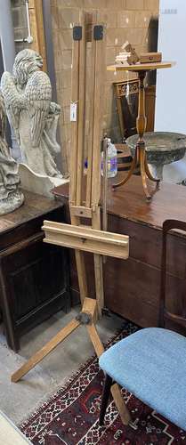 A beech adjustable artists easel