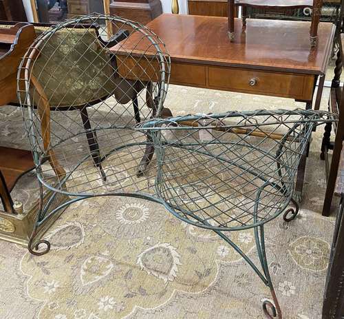 A painted wrought iron and wirework garden love seat, width ...