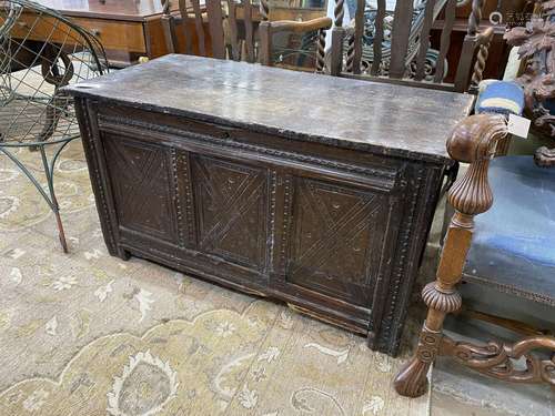 A 17th century carved oak coffer, length 110cm, depth 52cm, ...