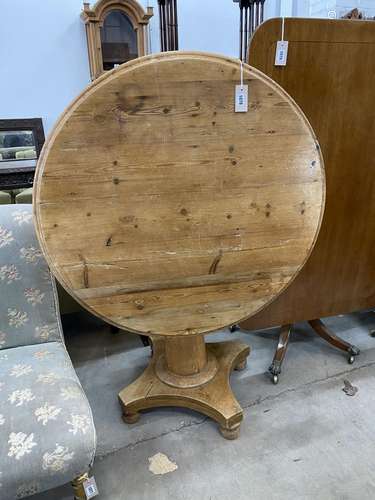 A Victorian circular pine tilt top breakfast table, diameter...