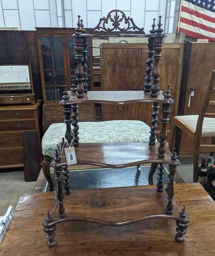 A small Victorian rosewood serpentine fronted four tier what...