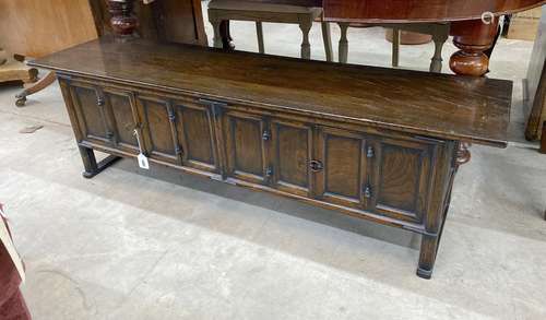 A Chinese elm low cabinet, length 145cm, depth 36cm, height ...