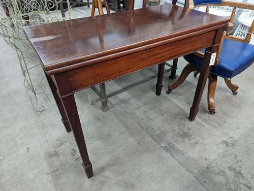 An Edwardian rectangular mahogany folding tea table, width 9...