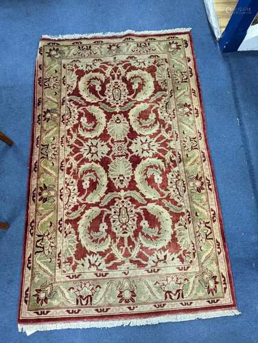 A Zeigler red ground rug, 160 x 100cm