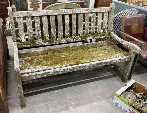 A weathered teak slatted garden bench, length 152cm, depth 6...