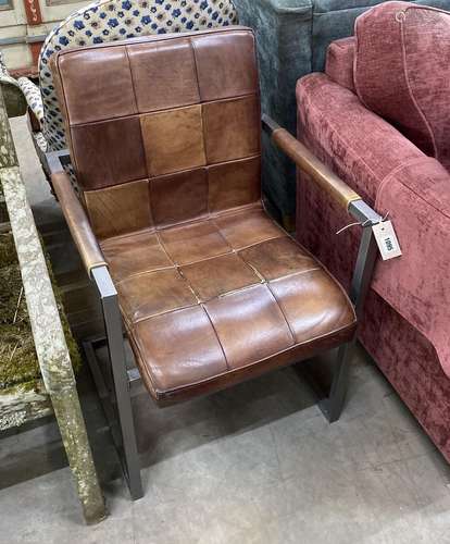 A modern chrome and tan leather desk chair, width 56cm, dept...