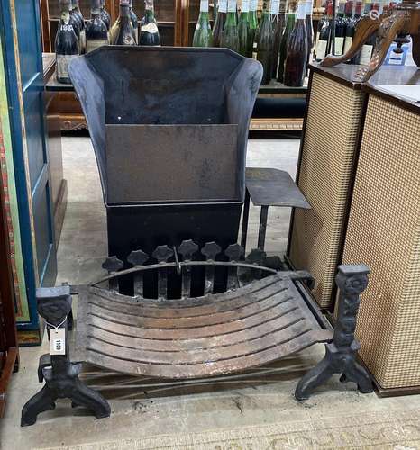 A cast iron fire basket, width 88cm, depth 37cm with dogs an...