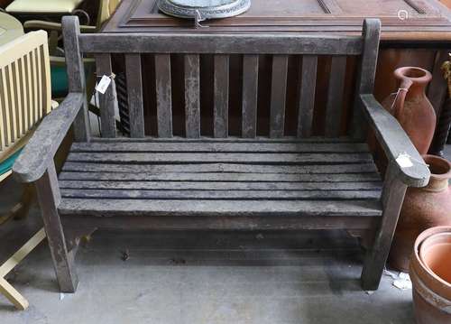 A weathered teak slatted garden bench, length 128cm, depth 6...