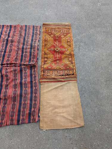 An Afghan Kilim flatweave saddlebag, 144 x 69cm together wit...