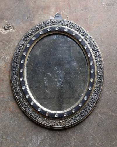 An Irish style oval silvered wall mirror, width 40cm, height...