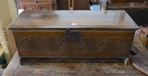 A 17th century carved oak six plank coffer, W 99, D 36, H 38...