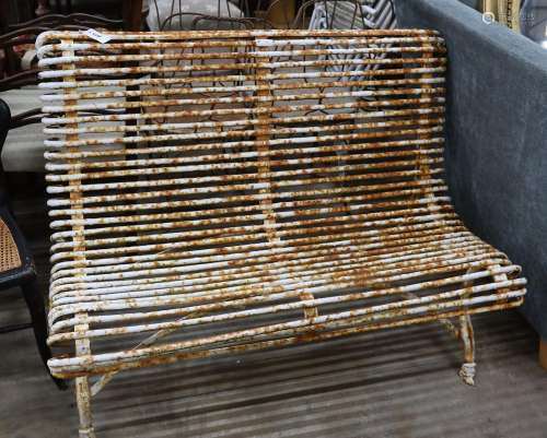 A painted wrought iron Aras bench, length 118cm, depth 66cm,...