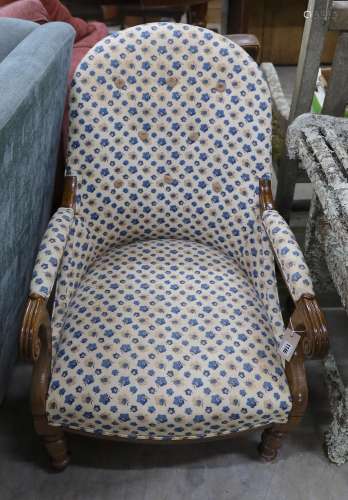 A Victorian walnut spoon back open armchair, width 60cm, dep...