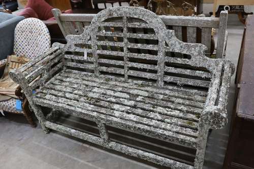 A Lutyens style lichen covered teak garden bench, length 160...