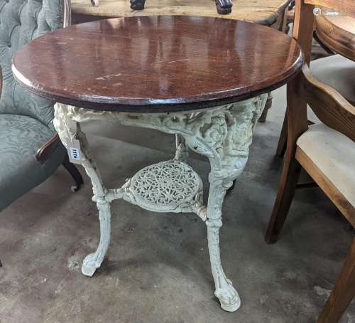 A Victorian white painted cast iron Britannia pub table with...