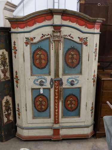 An early 19th century Tyrolean painted pine armoire, width 1...