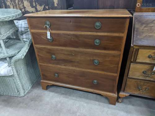 A Regency mahogany two part chest of four long drawers, widt...