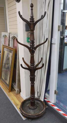 A mid Victorian mahogany hallstand, with circular lead lined...