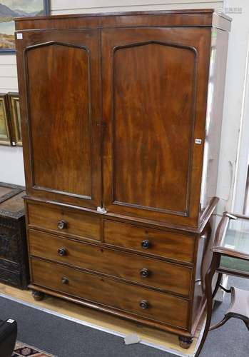 A Regency mahogany linen press, the top retaining sliding tr...