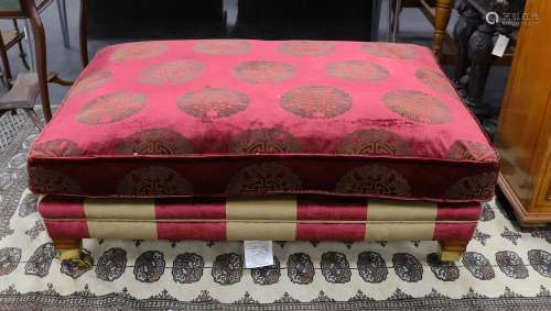 A large Duresta rectangular footstool upholstered in a Chine...