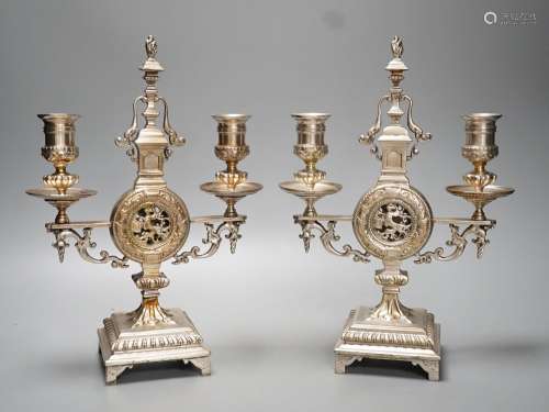 A pair of Winn & Co., Birmingham silvered brass two bran...