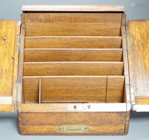 A Victorian oak stationery box with original fittings