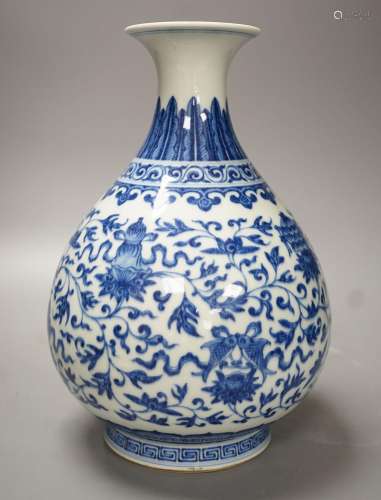 A Chinese blue and white Ming style lotus vase, Yuhuchunping...