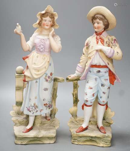 A pair of bisque figures - 34.5cm