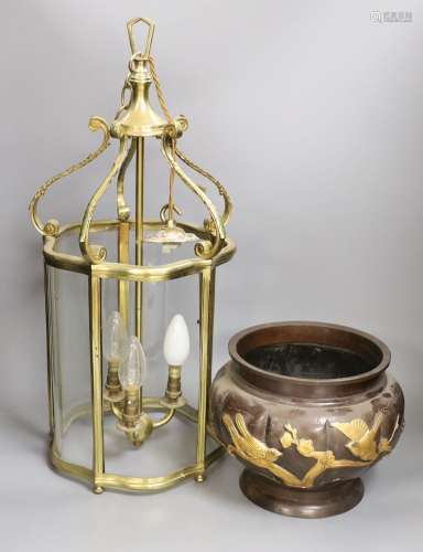 A three light brass lantern and a Japanese bronze jardiniere