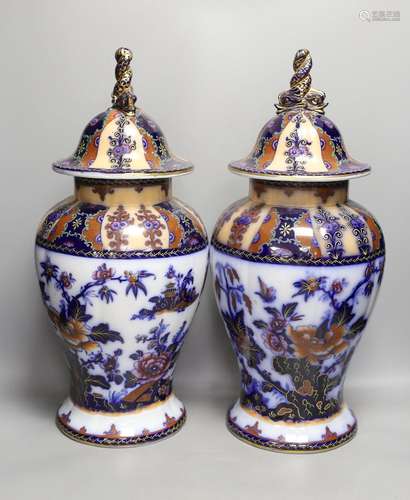 A pair of mid 19th century ironstone vases and covers - 51cm...