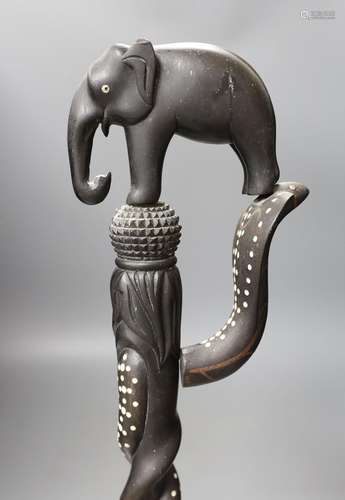 A late 19th/early 20th century Ceylonese carved ebony ‘eleph...