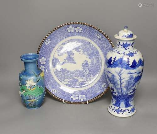 An early 20th century Chinese blue and white lidded vase tog...