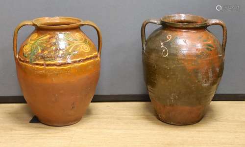 Two 19th century Sussex slipware pottery urns - 35cm high