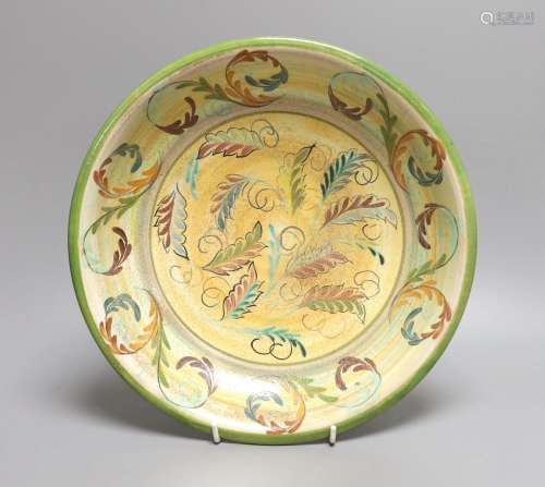 A painted studio pottery dish - 29cm diameter