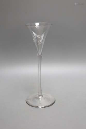 An 18th century unusually slender drawn trumpet ale glass - ...
