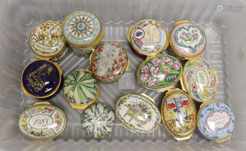 A collection of thirteen enamel boxes, mostly Halcyon Days.