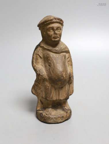 A terracotta figure of a man, possibly possibly mediaeval 13...