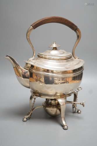 A George V silver tea kettle on stand, with burner, Heming &...