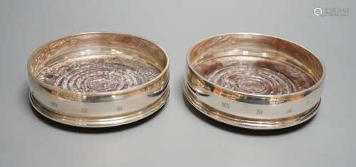 A pair of modern silver mounted wine coasters, London, 1990,...