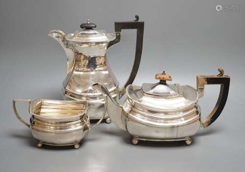 A George V matched silver part tea set, comprising a hot wat...