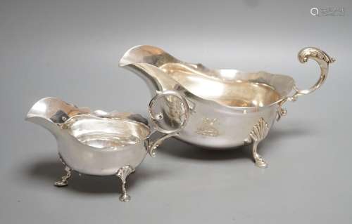 A modern silver sauceboat by Roberts & Belk and a smalle...