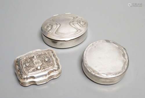 Three assorted continental white metal pill boxes including ...