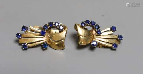 A stylish pair of mid 20th century yellow metal and sapphire...