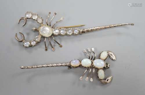 Two white metal scorpion brooches, one set with moonstones, ...