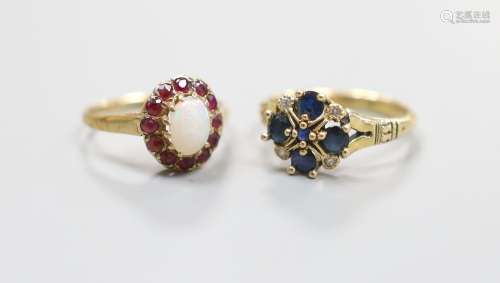 A modern 14ct gold, sapphire and diamond set cluster ring, s...