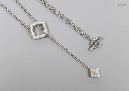 A modern 750 white metal and diamond cluster set drop neckla...