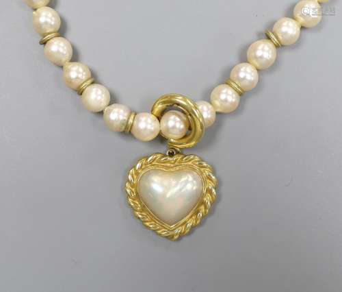 A 1960s single strand cultured pearl necklace, with an 18ct ...