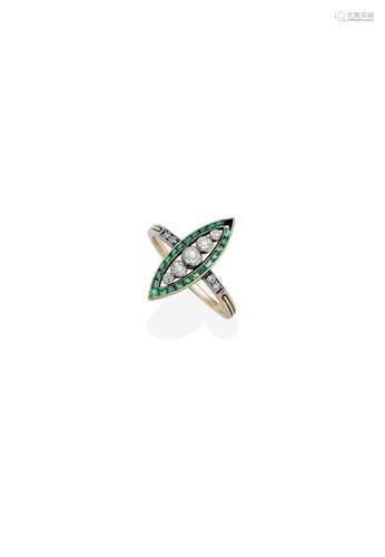 AN EMERALD AND DIAMOND RING